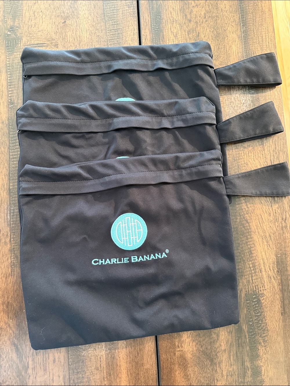 Charlie Banana Black Wet Bags with Teal Logo
